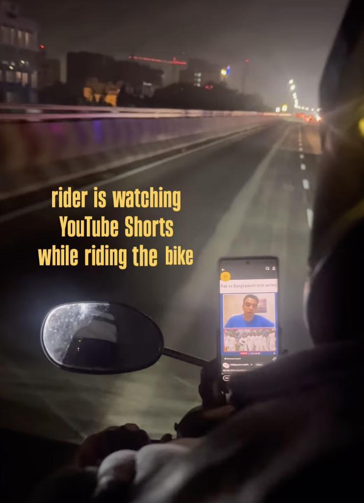 Rapido driver watches cricket match highlights while riding bike, passenger shares video