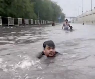 AAP shares video of man swimming in waterlogged Delhi roads