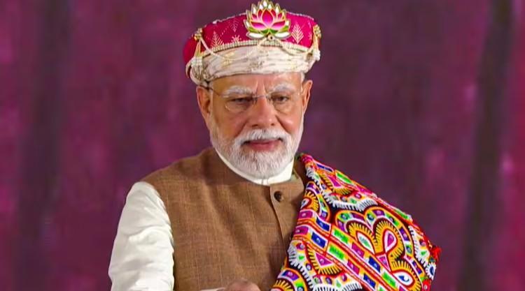 PM Modi wears pink pagdi & lotus brooch on 75th birthday