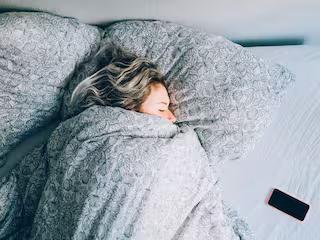 What happens when you sleep with your face covered with blanket?