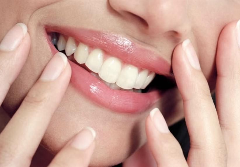 What do grey, purple and brown teeth signal?