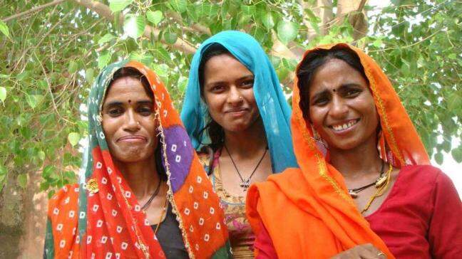 How is a CSR project empowering underprivileged women in India?