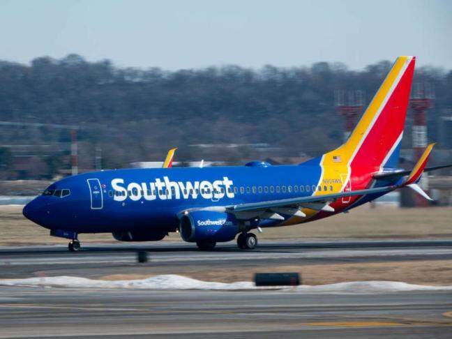 Southwest Airlines dips after Q2 miss, outlook cut by over 50%
