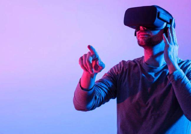 How is VR advancing wearable electronics?
