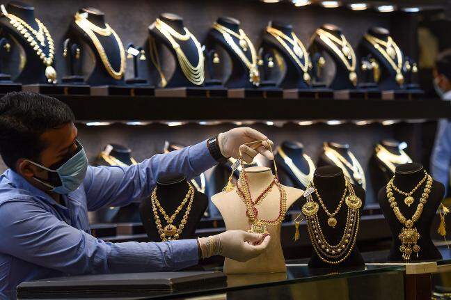 How have gold and silver performed this week as their prices saw record dips?