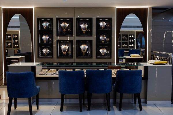 Gold slips as dollar strengthens, US rate-cut bets weighed